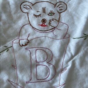 Vintage 2005 handmade embroidered quilt. Reversible.Bears/Baby, floral 37x57 in.